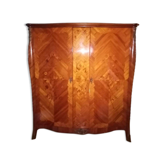 Splendid Louis XV style wardrobe in precious wood marquetry arched feet shod with clog.