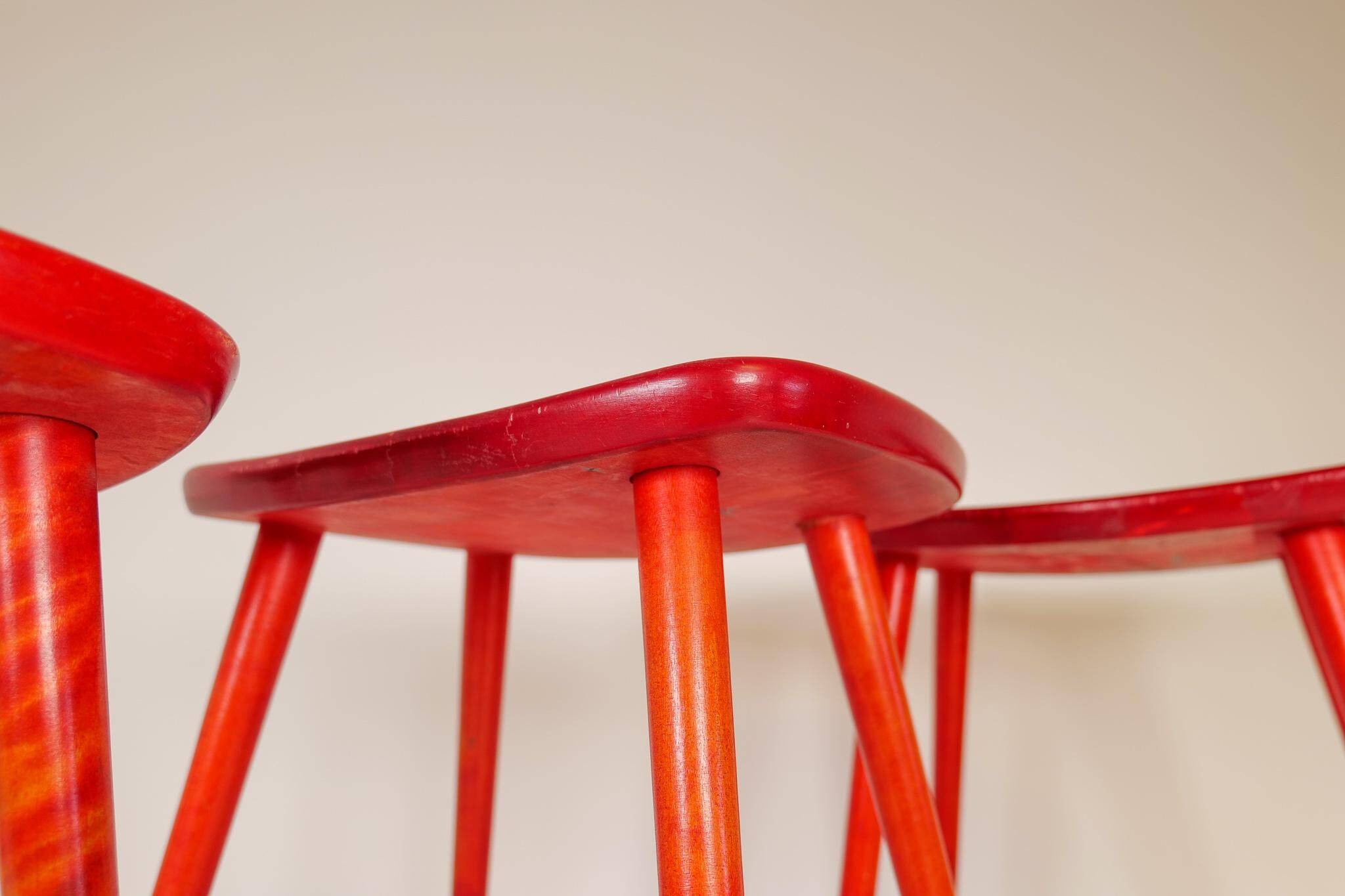 Swedish stools in red lacquered birch, Yngve Ekström "Palle", 1970s