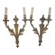 Pair of antique wall lights in Louis XVI style — Chiselled bronze — 2 arms —