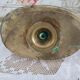 Brass pusher candle holder on oval frame