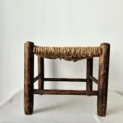 Small rustic vintage wooden and straw stool -