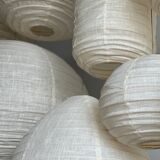 Suspension in rattan and natural japanese linen in the shape of a drop