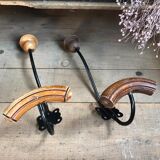 Pair of old wood and metal hooks