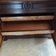 Victorian commode with a white marble top.