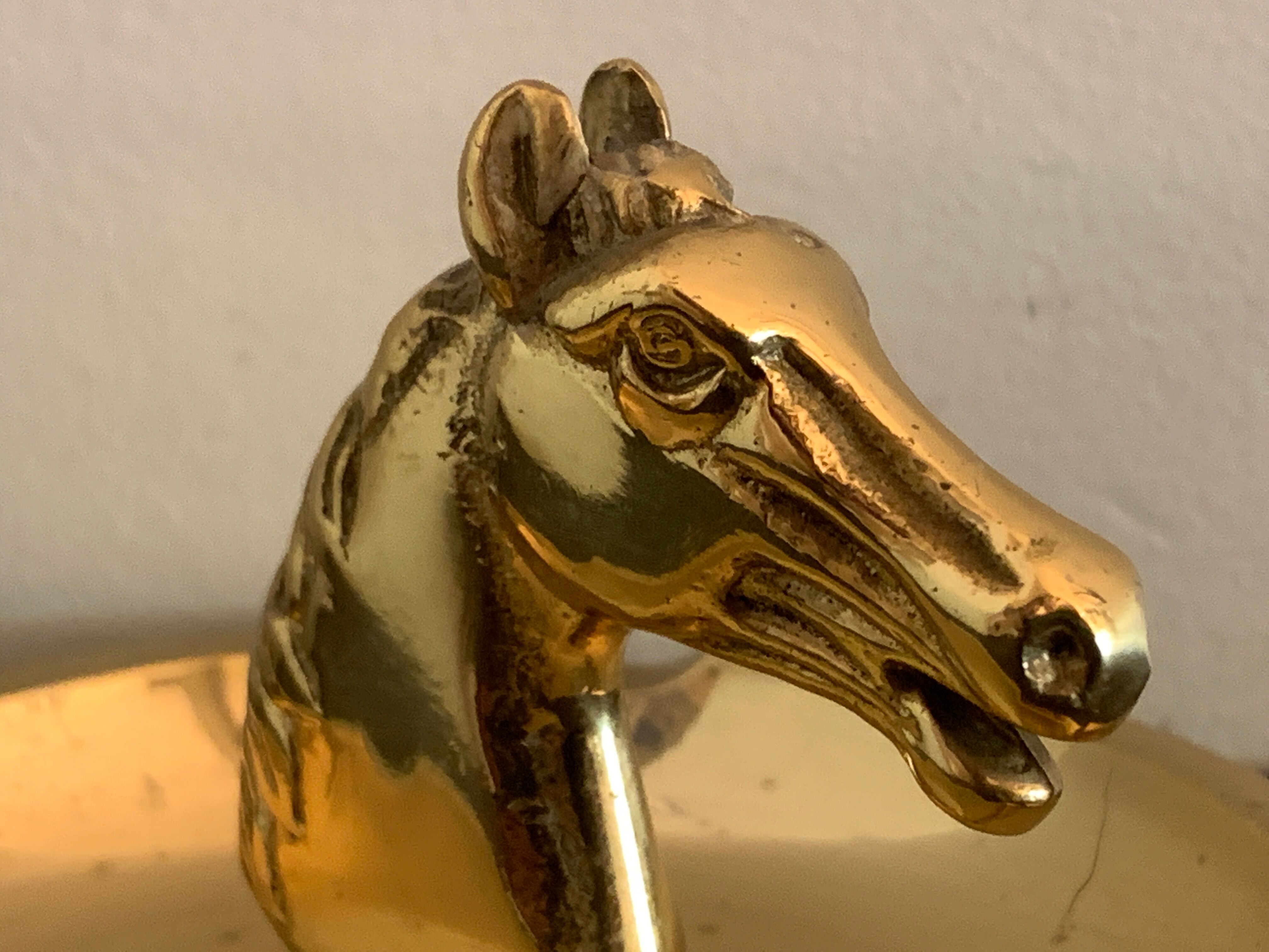 Horse-headed brass ashtray
