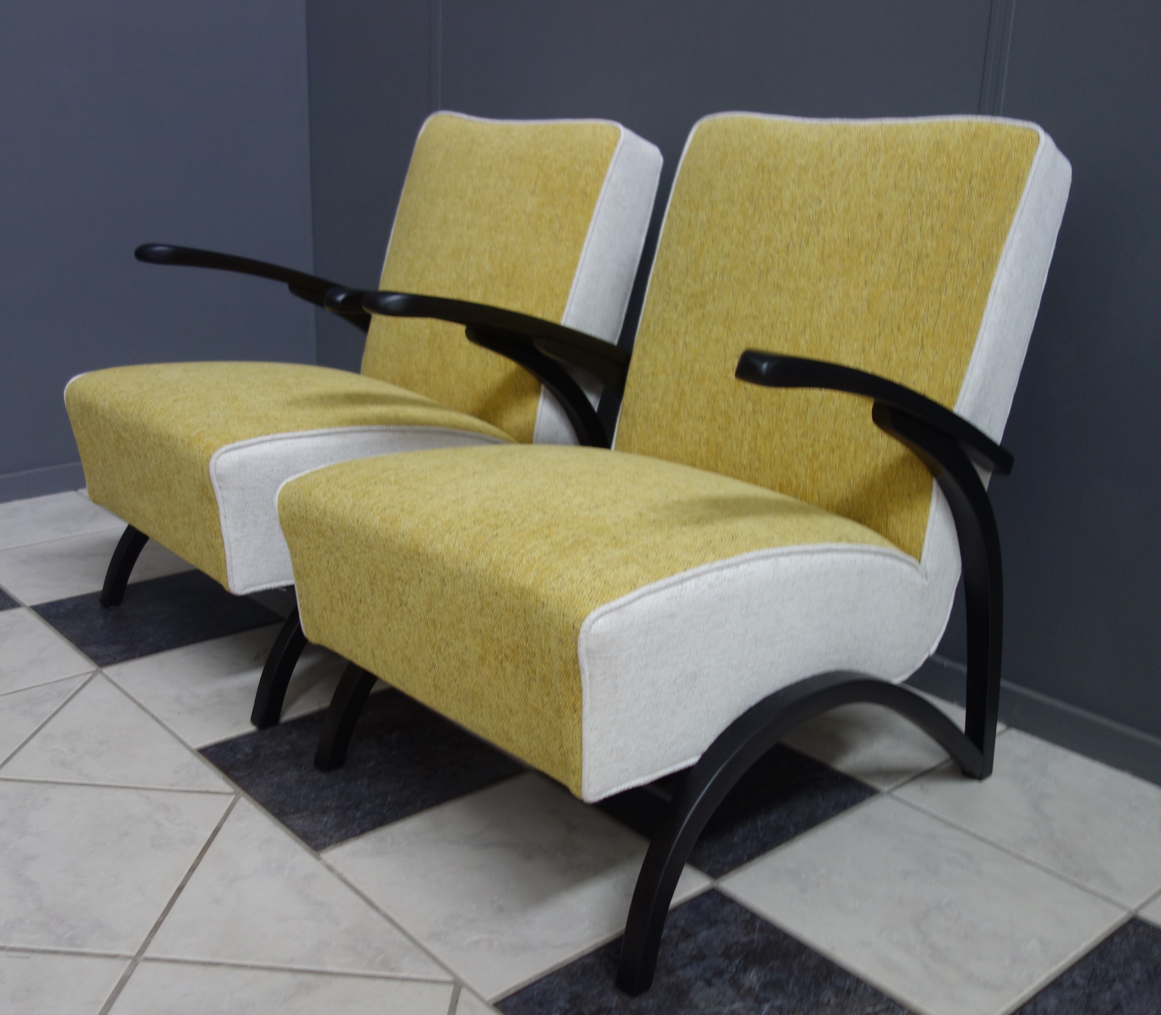 Jindrich halabala chairs yellow and white