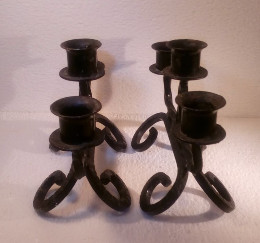 Pair of sconces in wrought iron