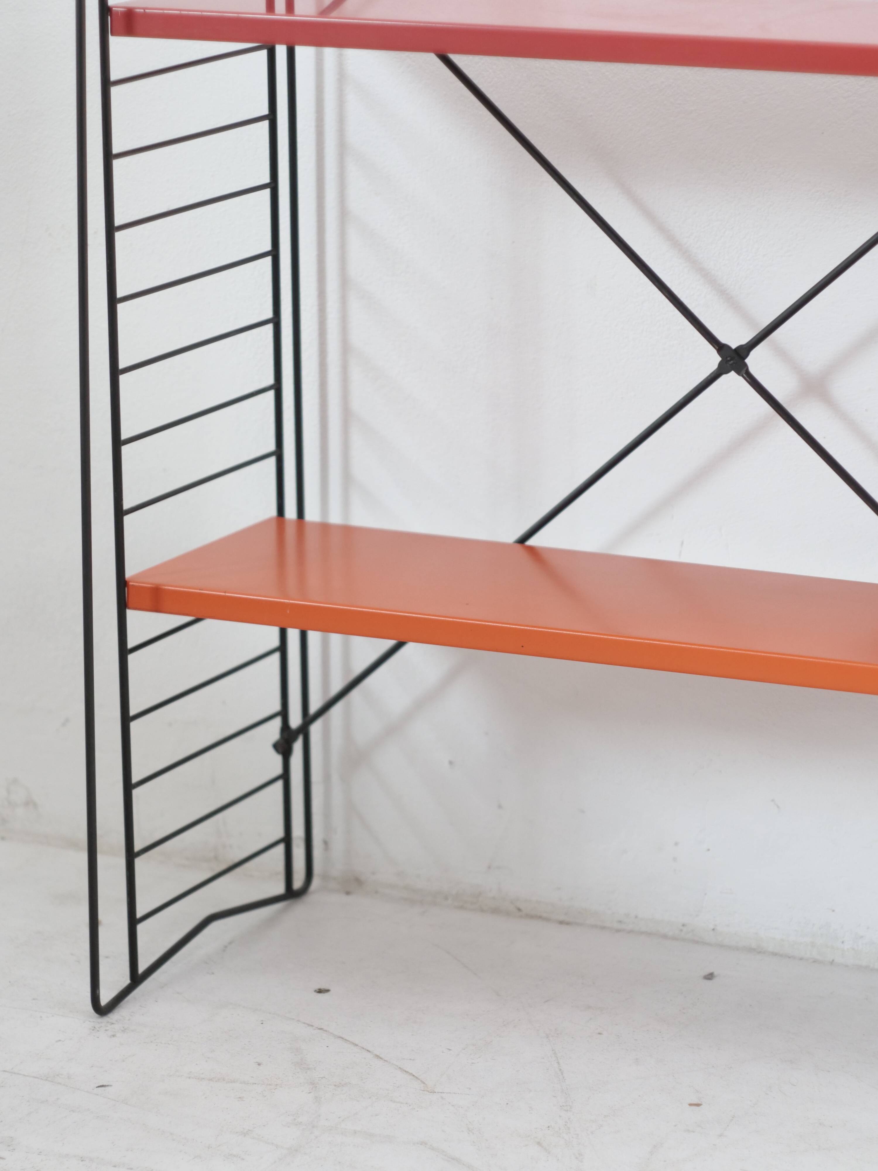 Tomado shelf in coloured metal floor shelves from 1958.