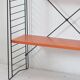 Tomado shelf in coloured metal floor shelves from 1958.