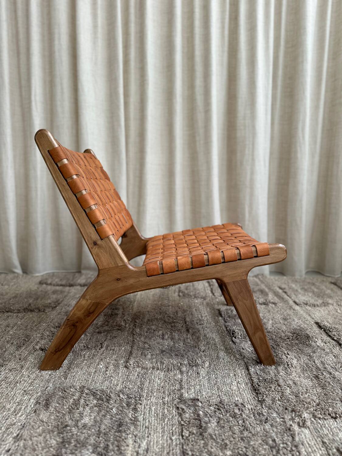 Pair of leather and walnut armchairs