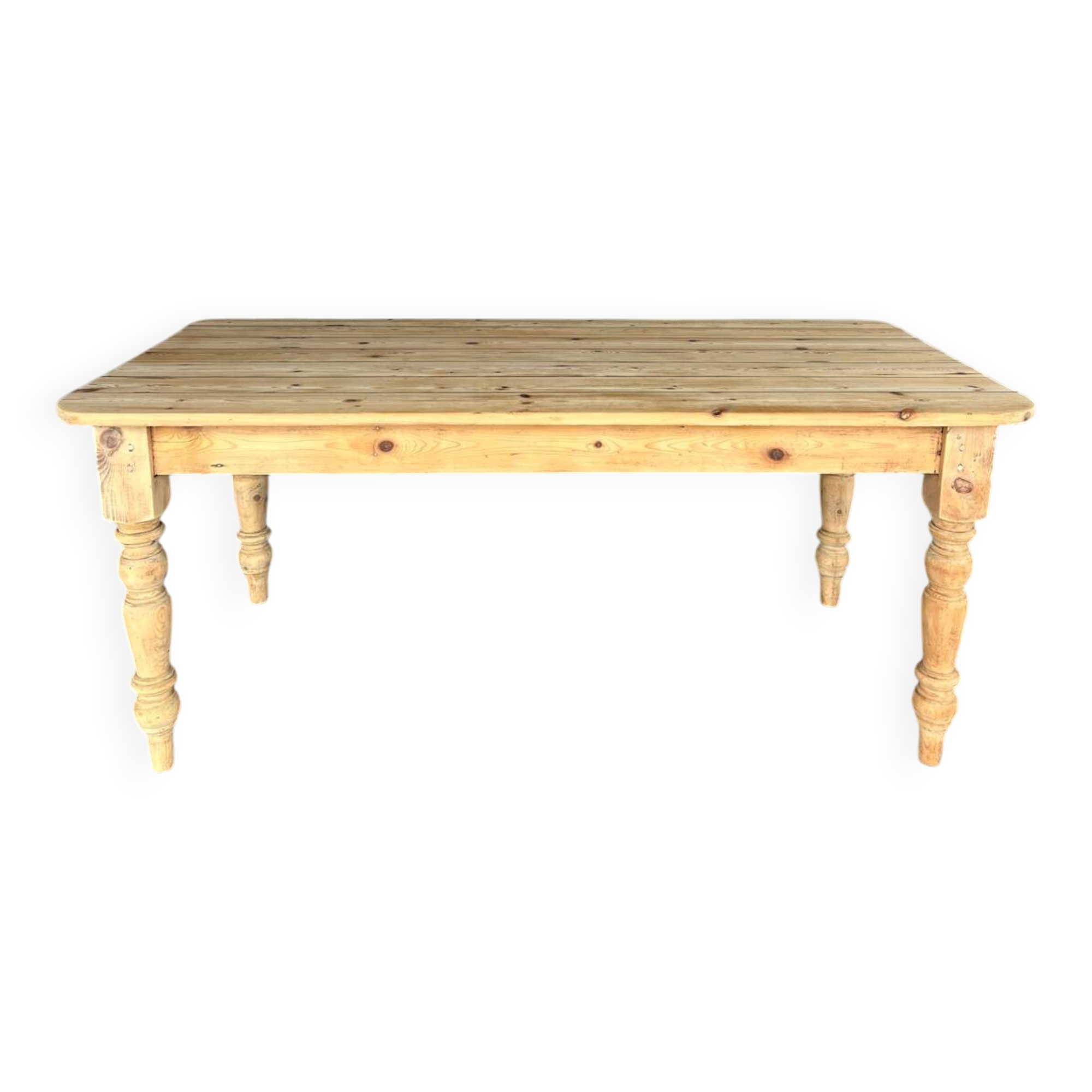 Old farmhouse table in raw wood
