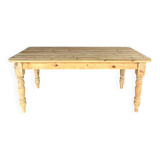 Old farmhouse table in raw wood