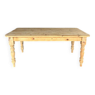 Old farmhouse table in raw wood