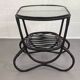 Black rattan and glass coffee table