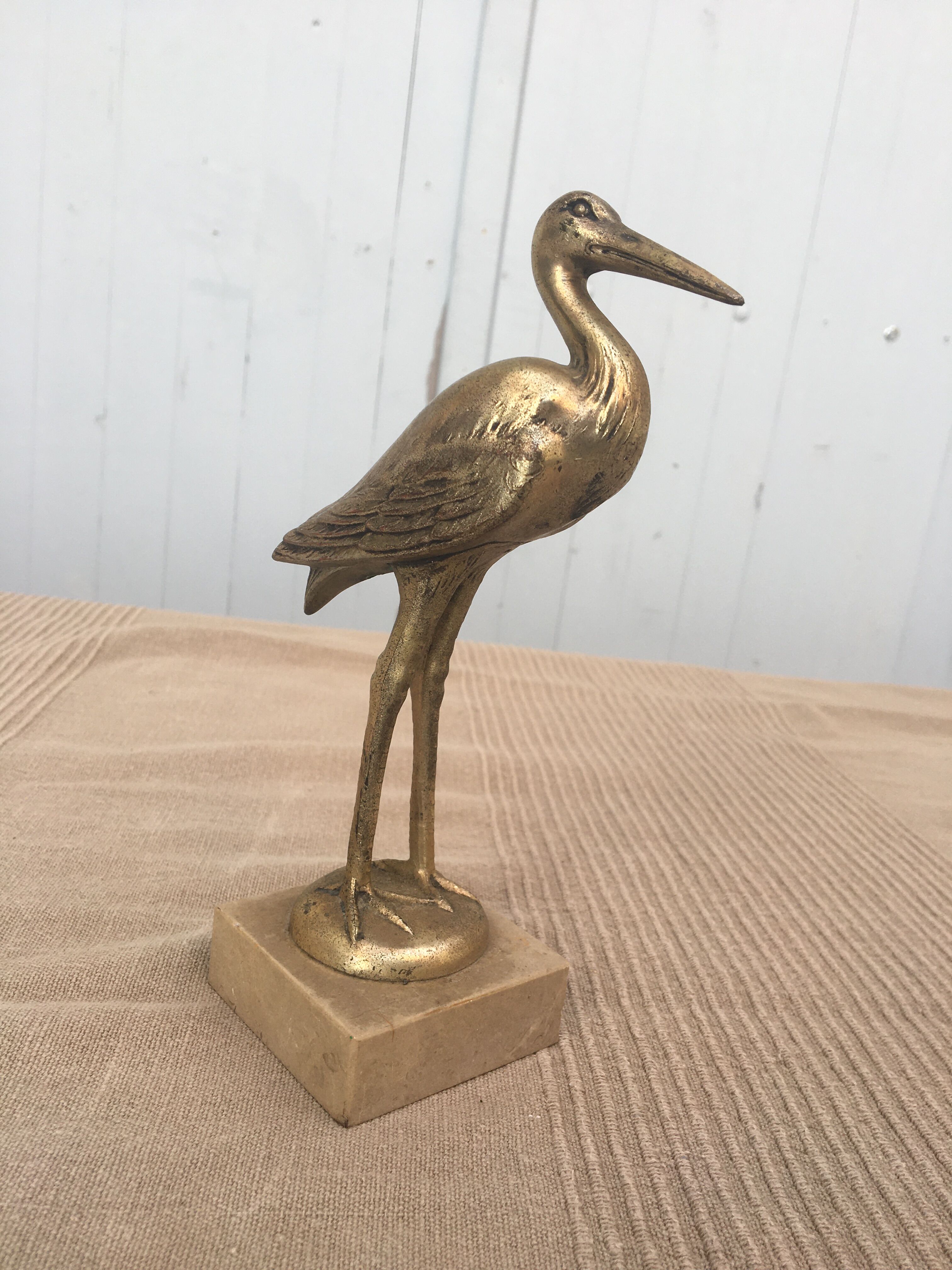 Heron brass statuette