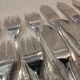 12 forks, 12 fish knives, silver-plated metal, rocaille pattern