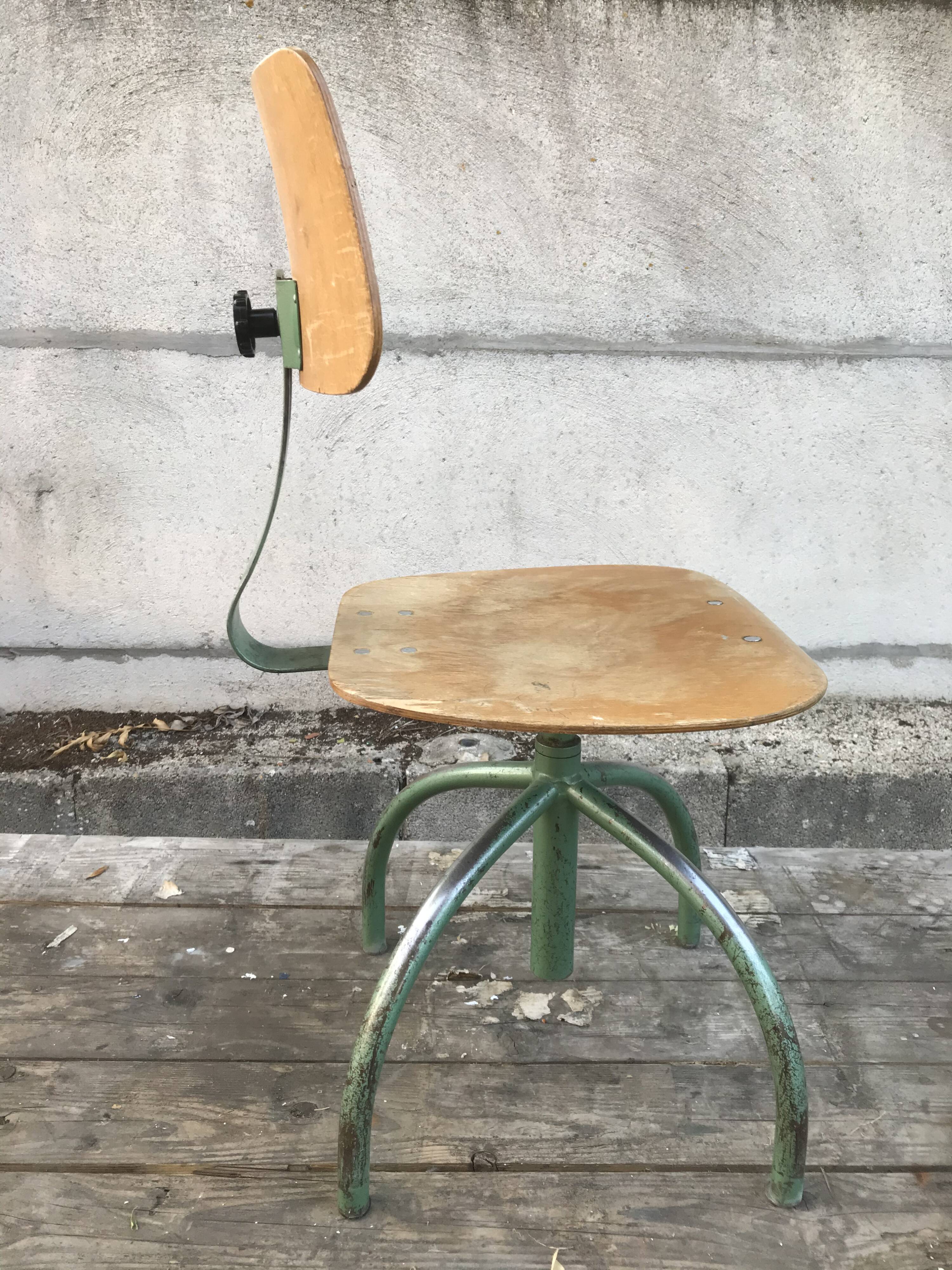 Former green metal workshop chair