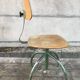 Former green metal workshop chair