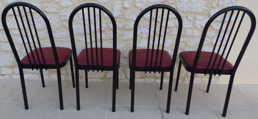 4 metal chairs with burgundy imitation leather seats from the Souvignet brand