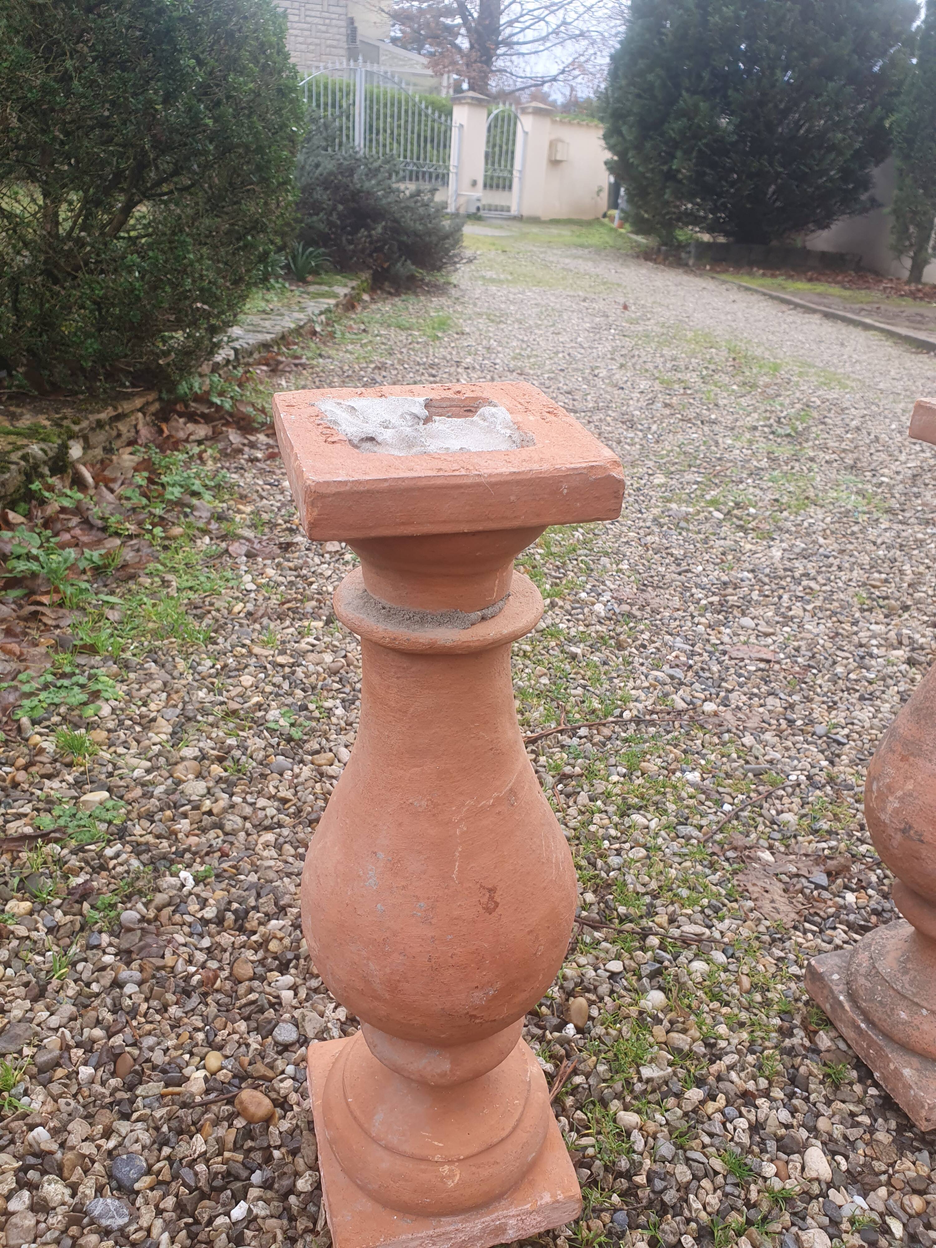 About twenty terracotta balusters from Castelnaudary