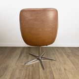 1970s swivel chair with faux leather shell and chrome.