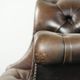 Vintage Chesterfield office chair with decorative nails in English style