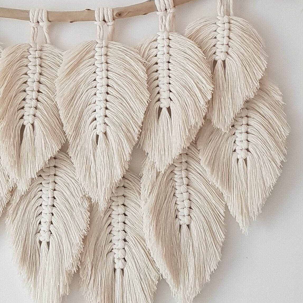 Macramé wall hanging feathers