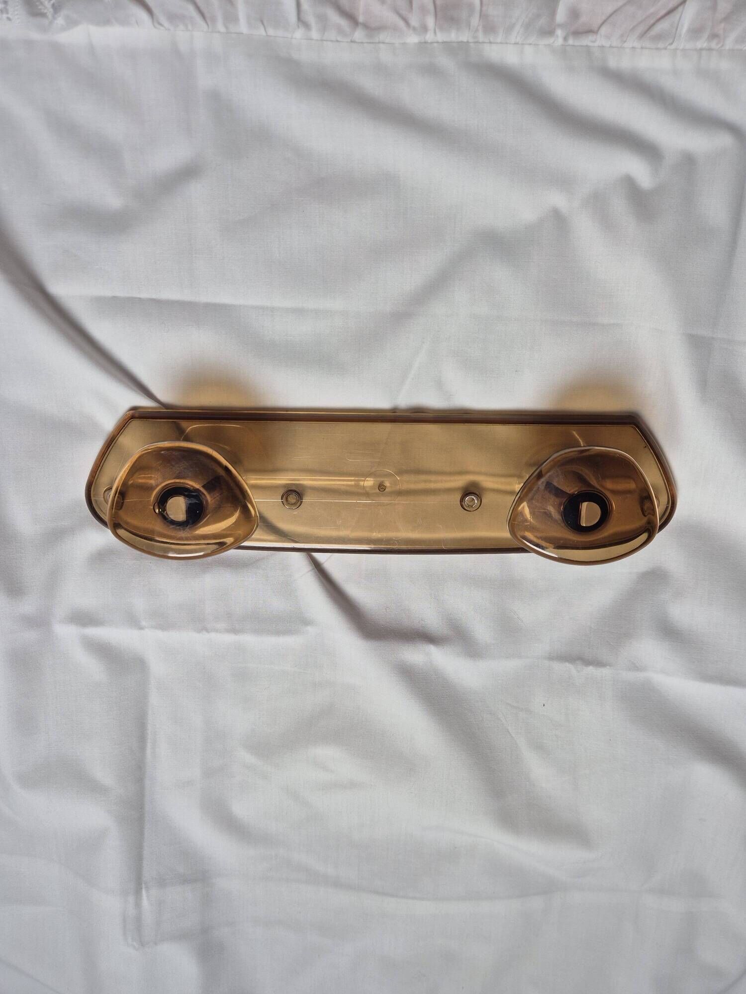 vintage translucent brown coat rack