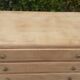 Commode 4 tiroirs pieds compas bois brut vintage
