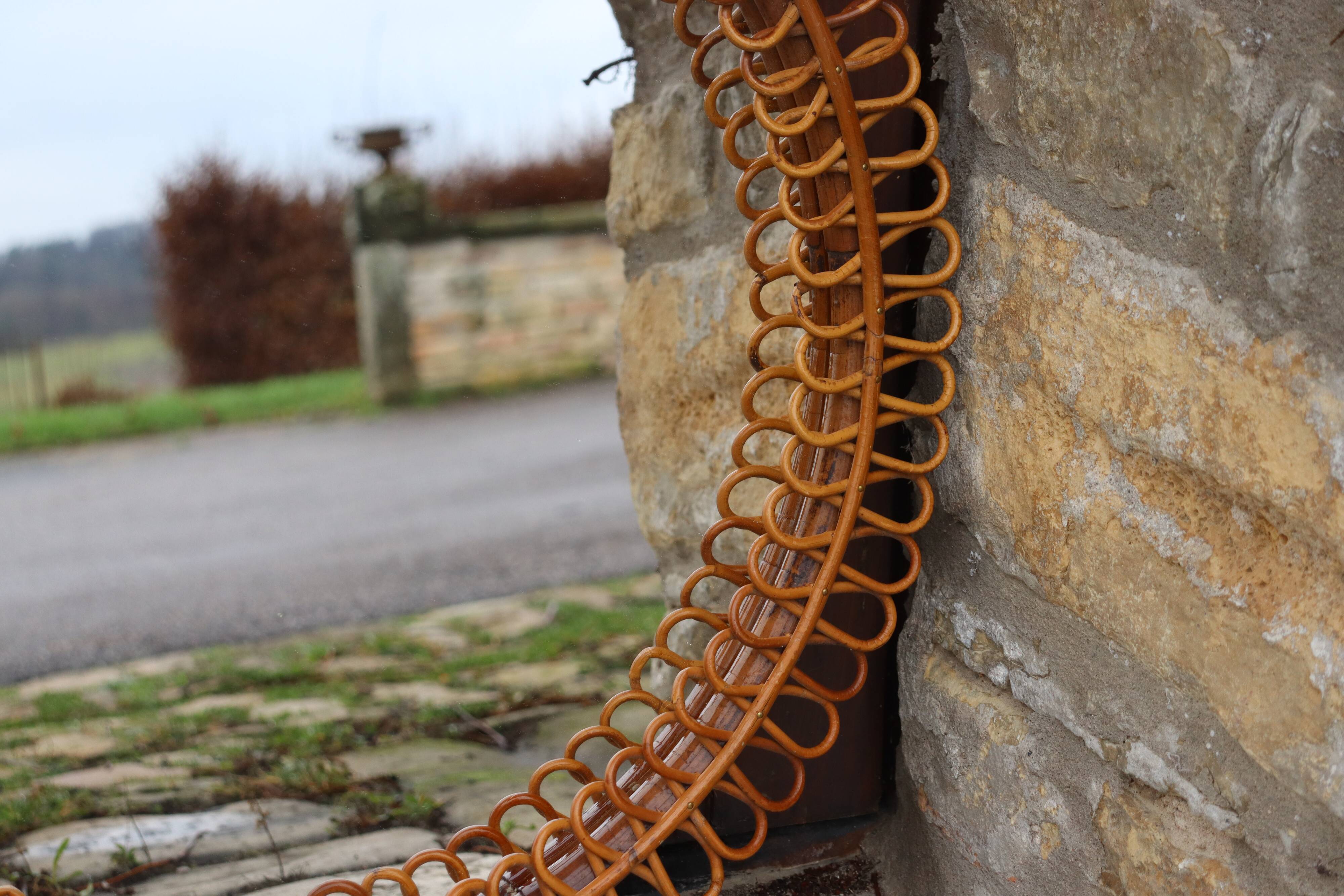 Italian rattan wall mirror, 1960s