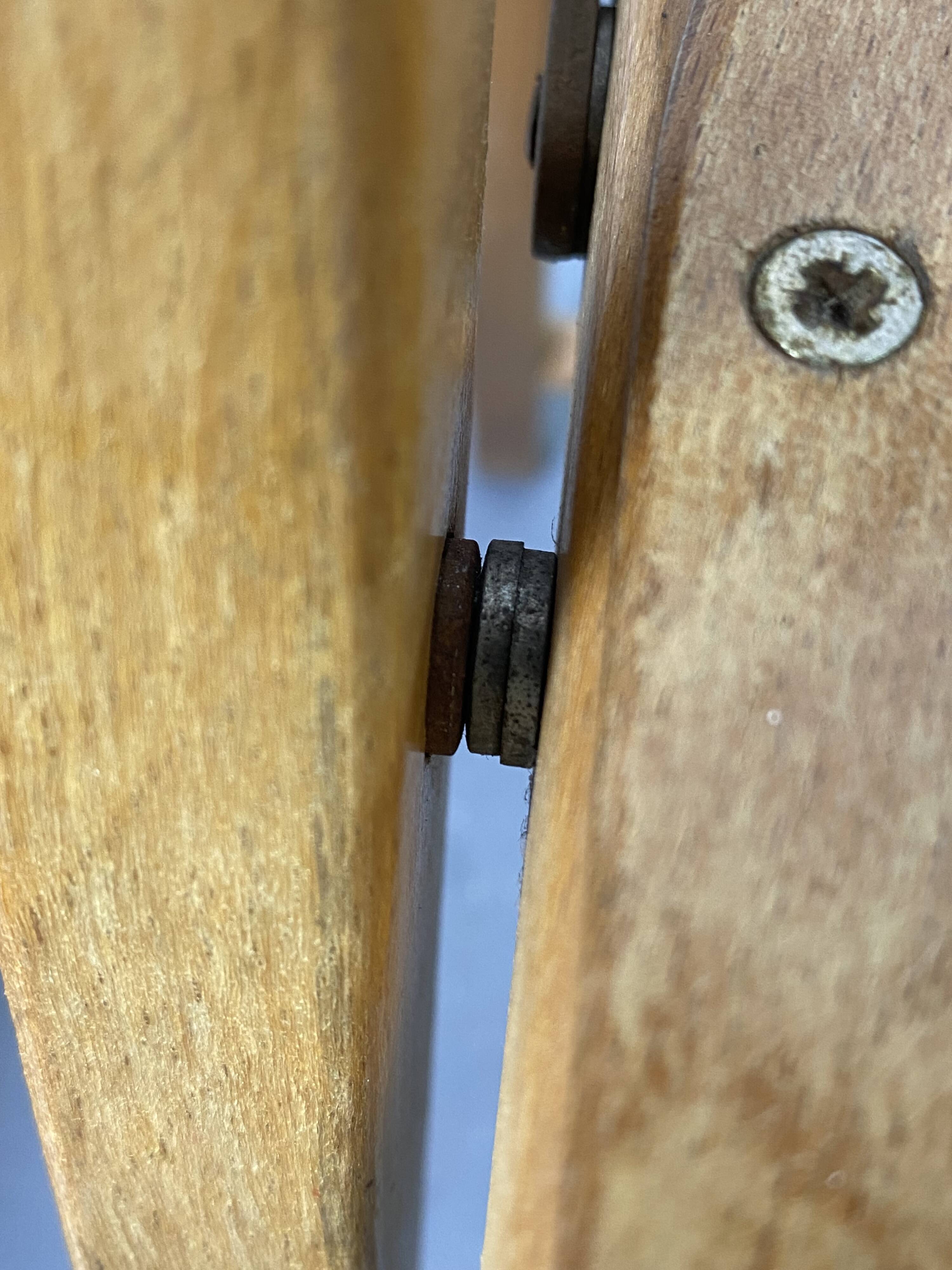 Pair of mismatched wooden folding chairs