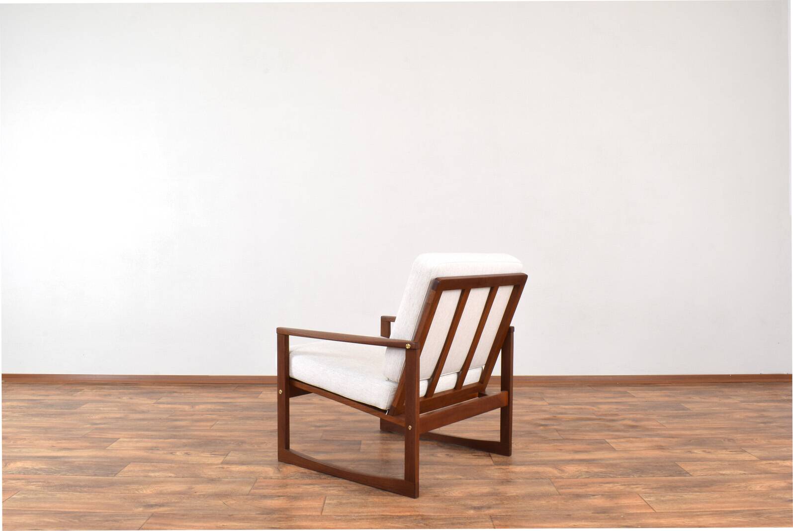 Fauteuil en teck danois des années 1960.