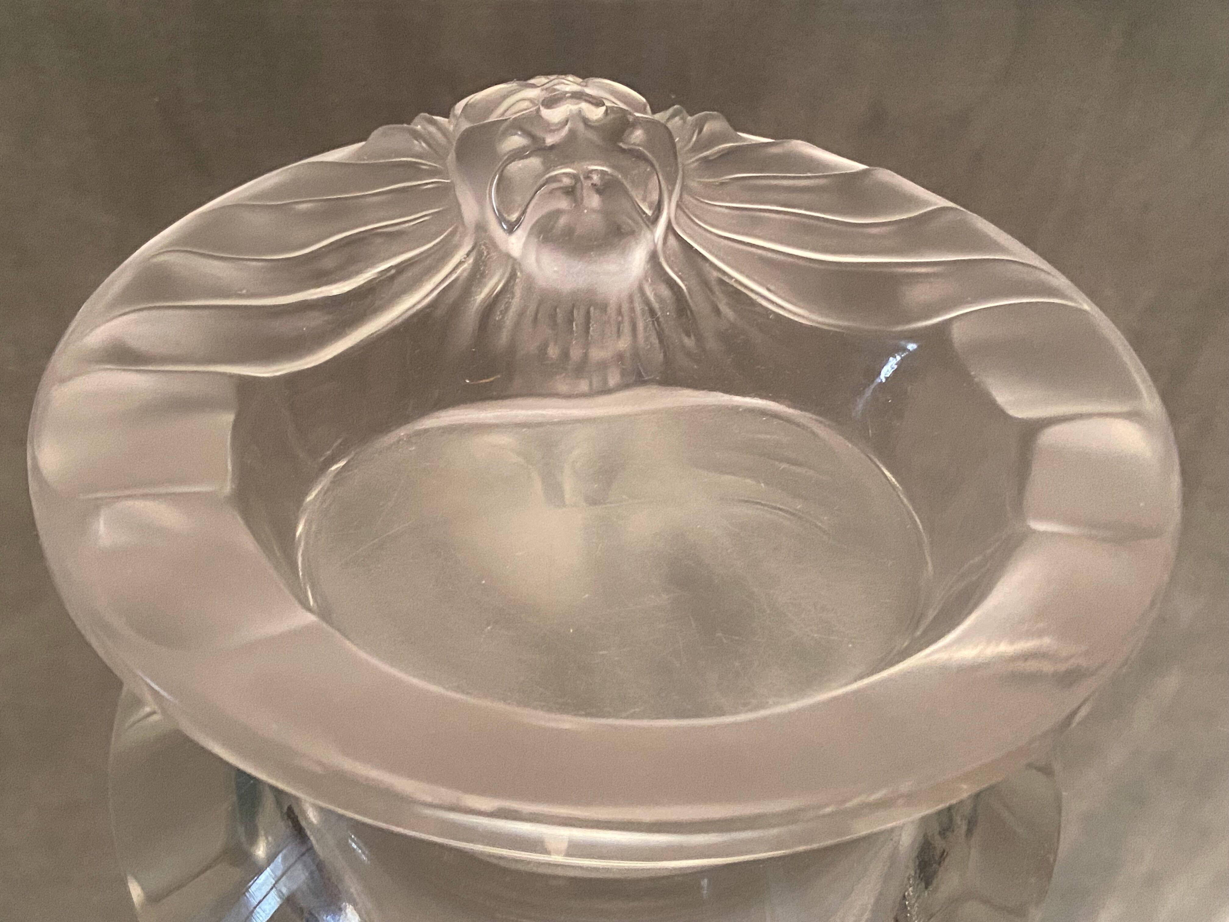 Cup decorated with lion's head signed Lalique