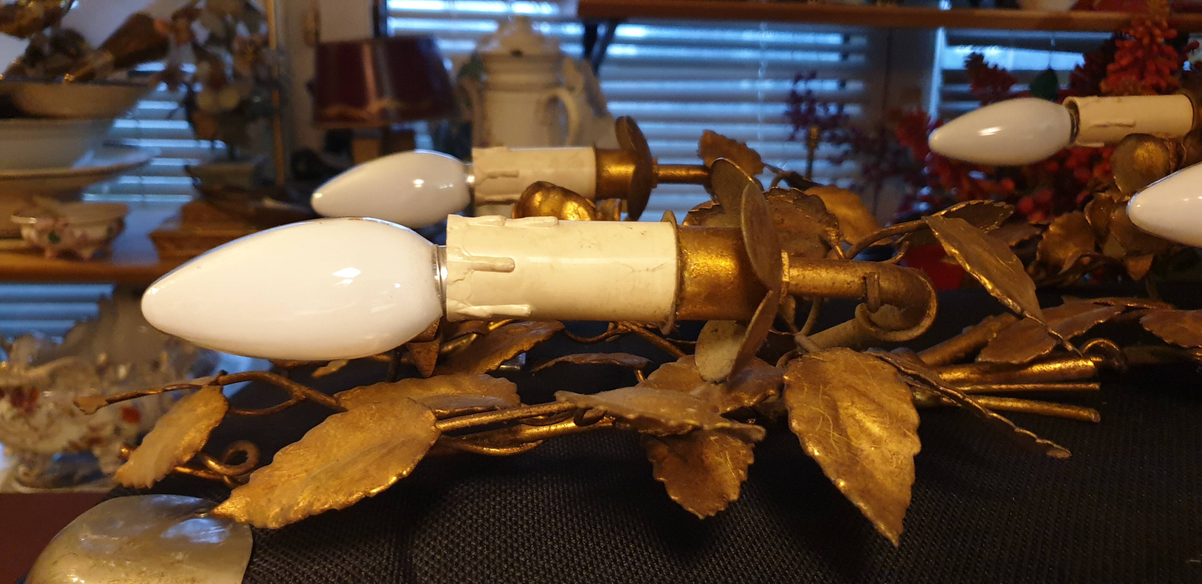 Pair of gold metal wall lights