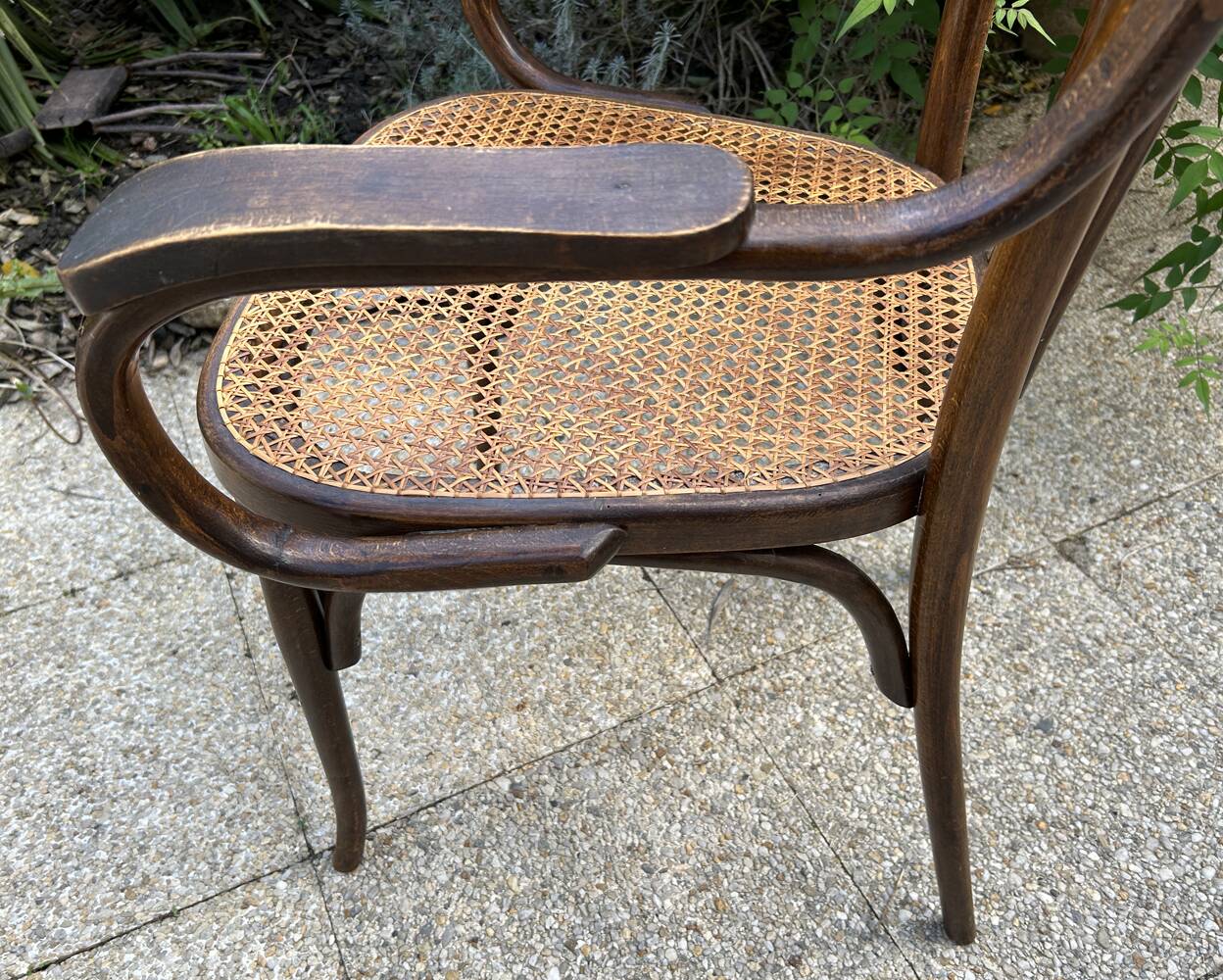 Baumann caned curved wooden armchair, 1900
