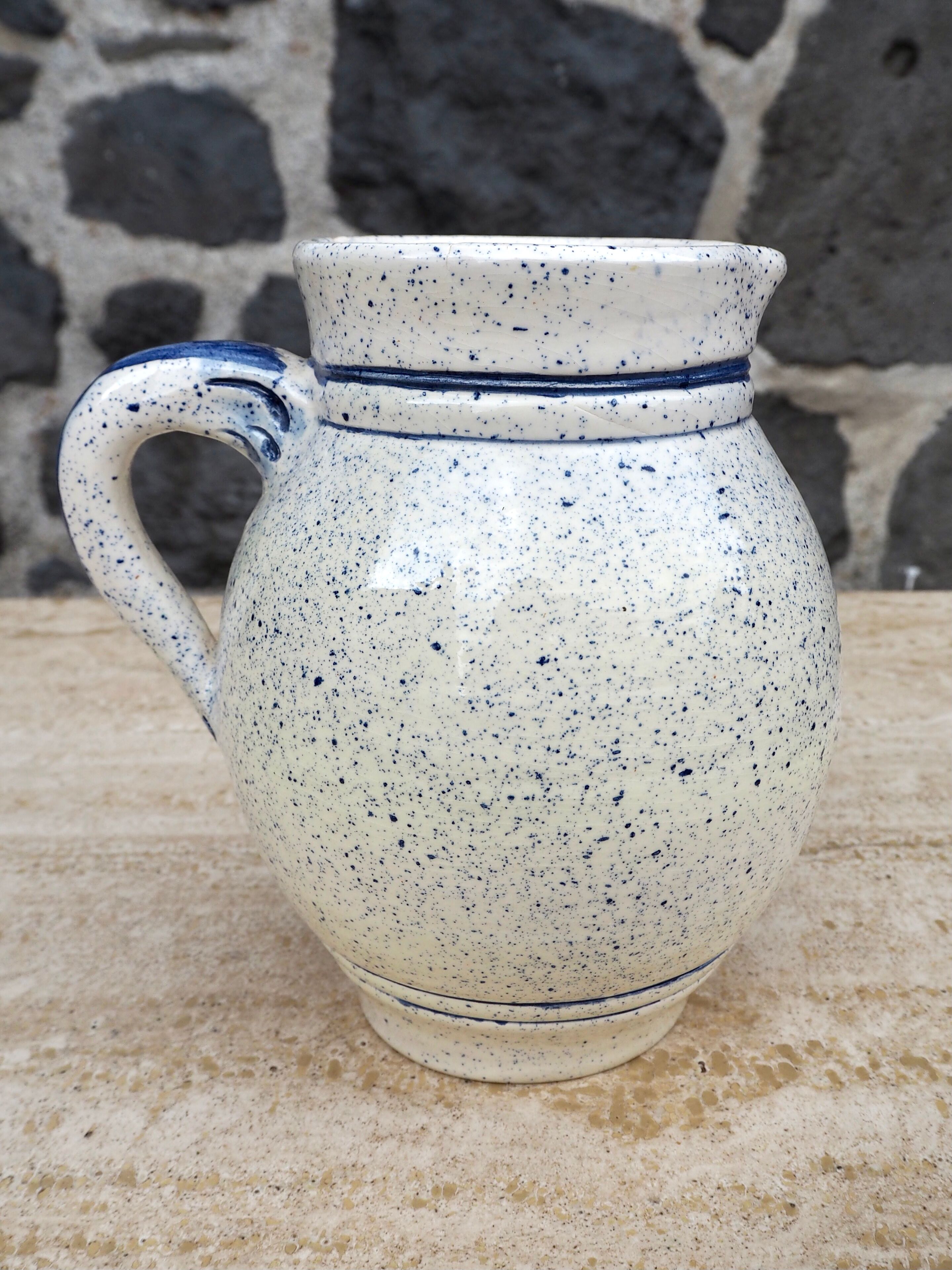 Speckled ceramic pitcher