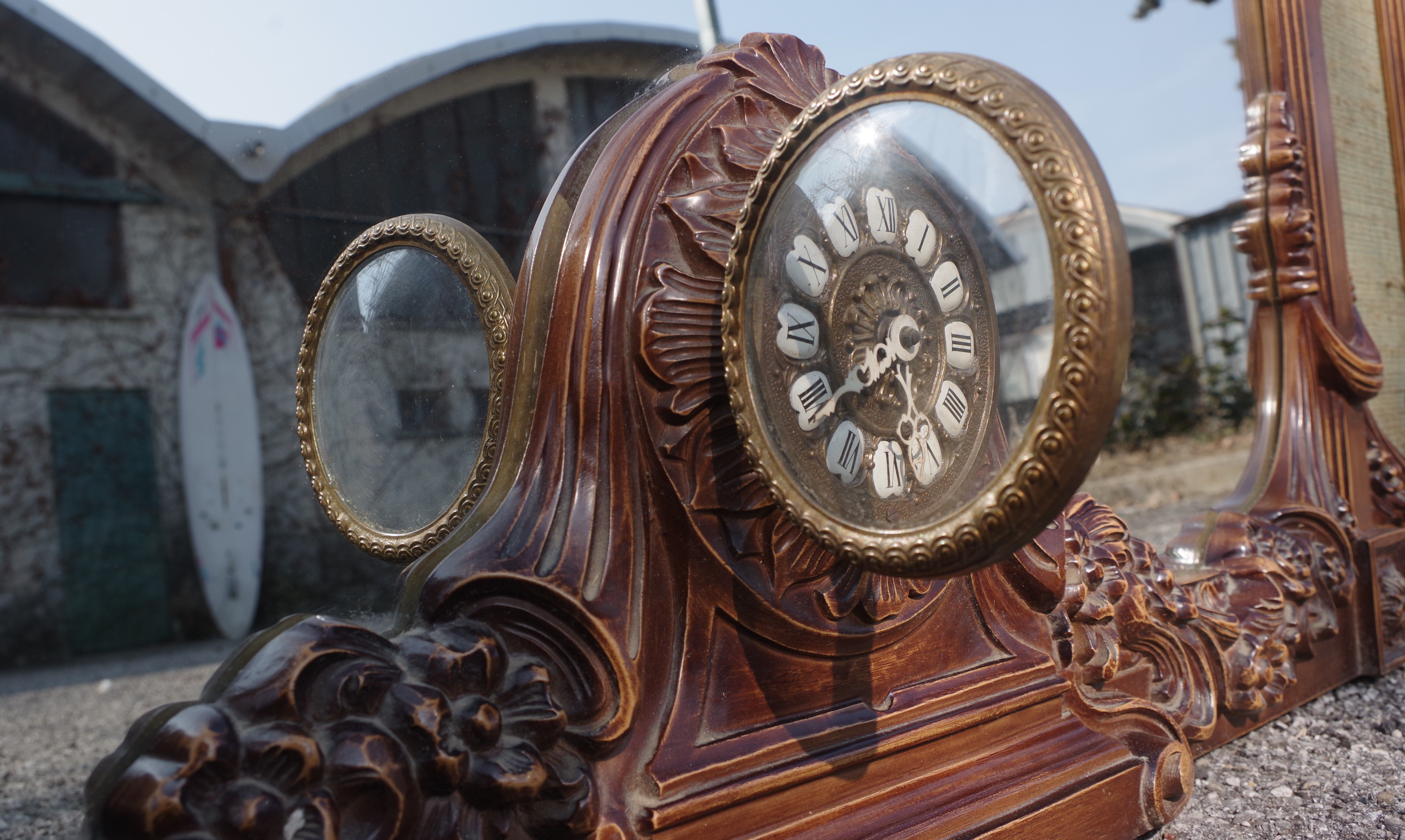 Wooden mirror with clock, 1960