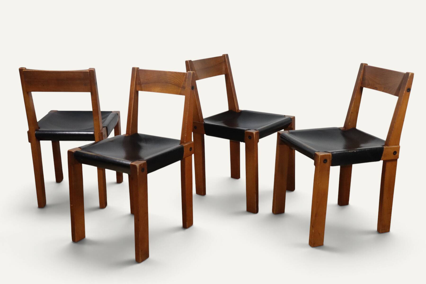Set of 4 S24 chairs by Pierre Chapo – Solid elm and black leather – 1970