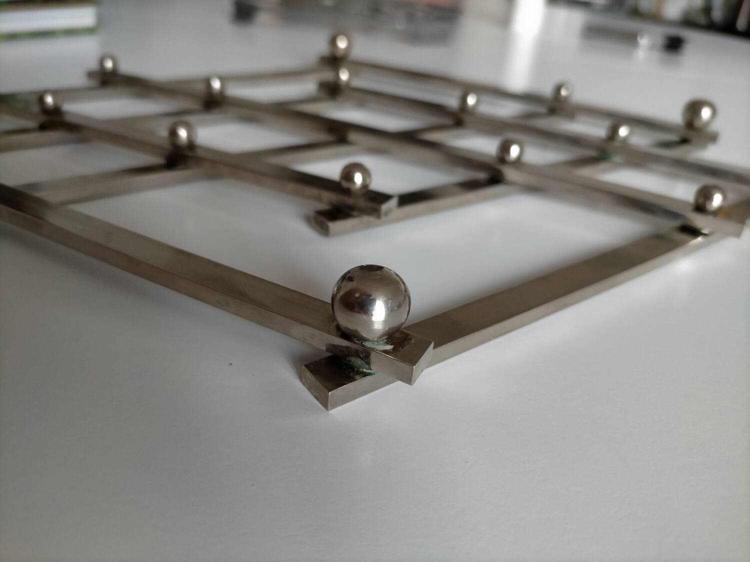 Jacques Adnet metal trivet in very good condition