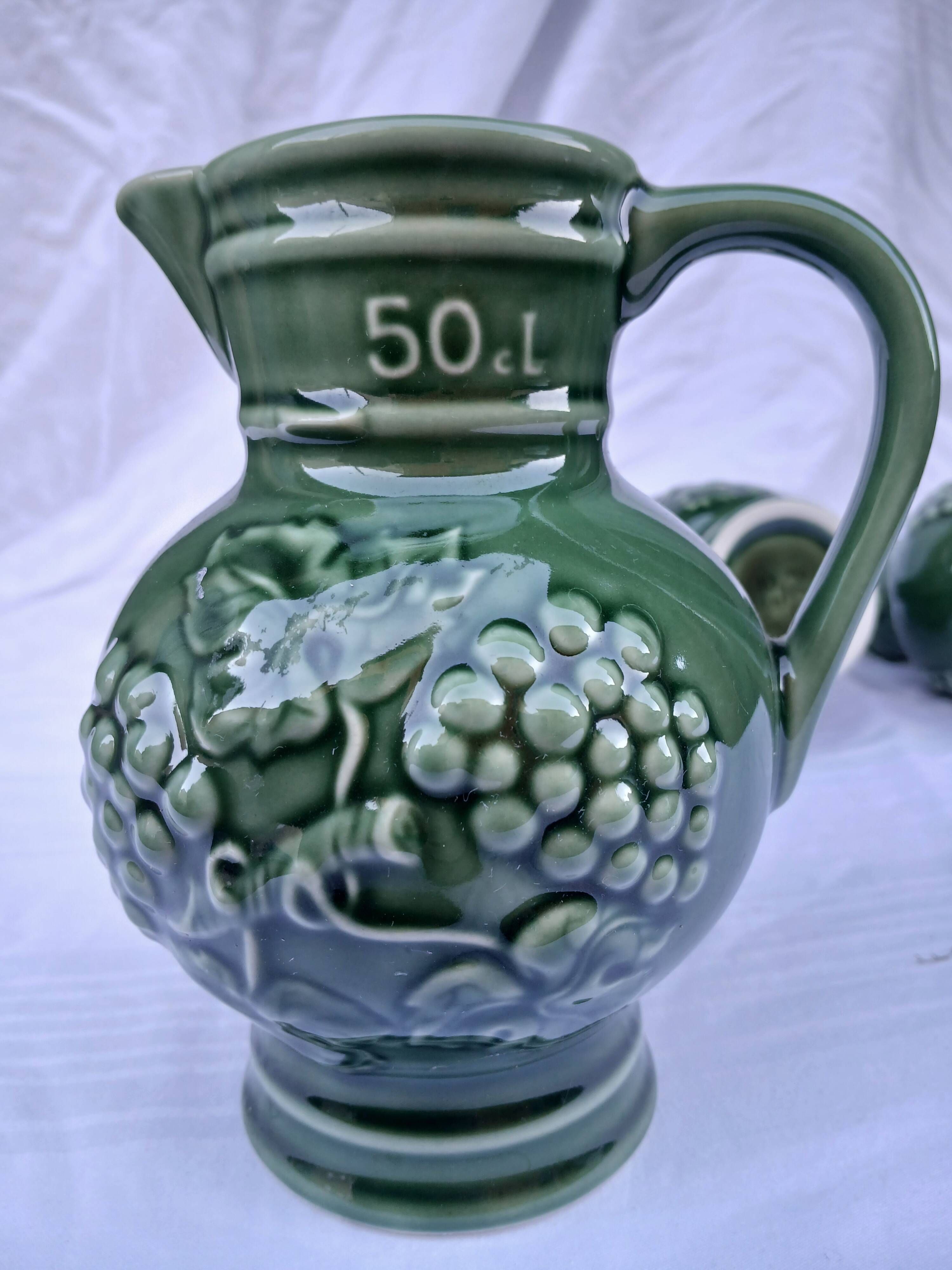 3 antique wine jugs