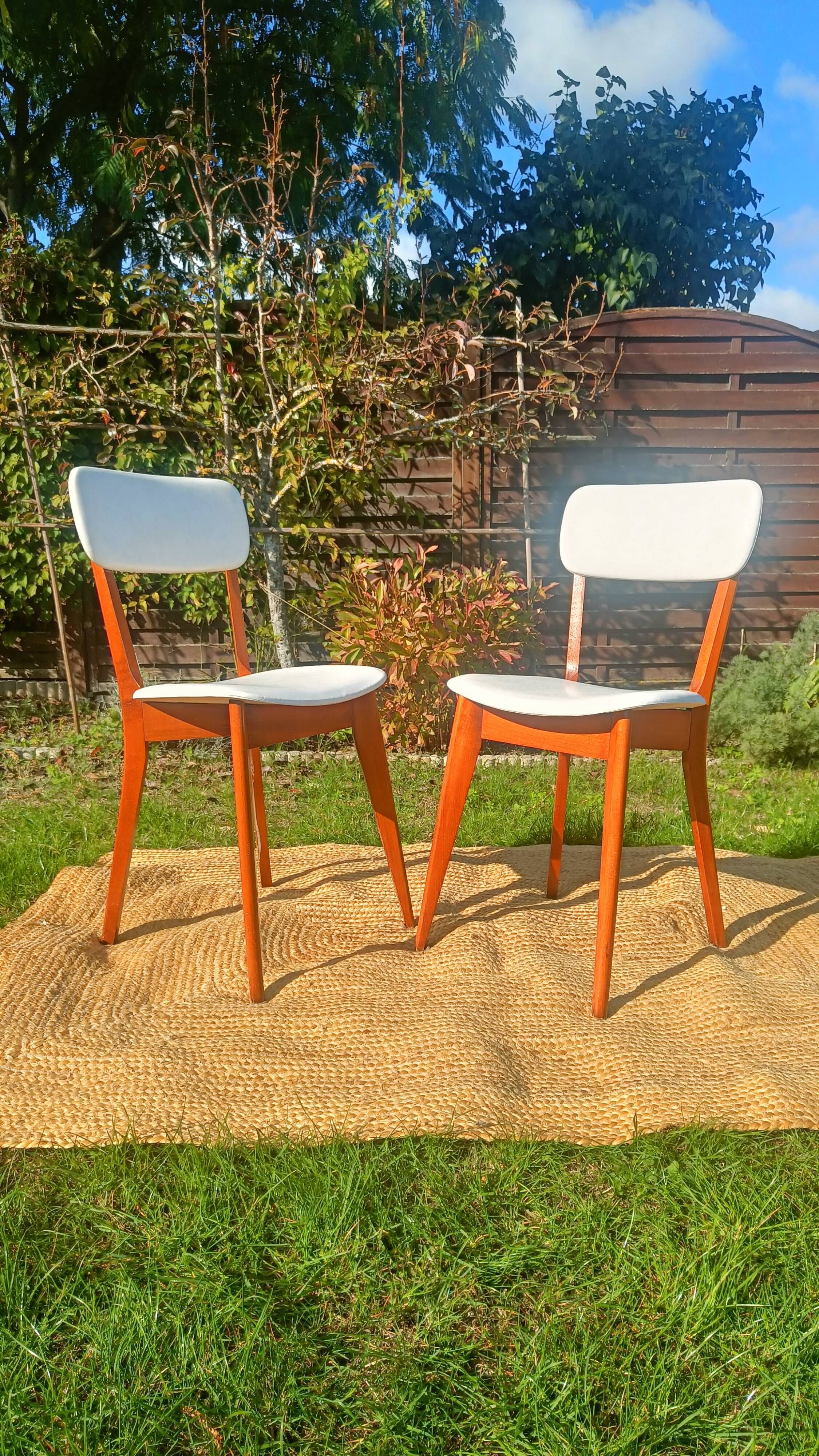 vintage wooden chairs with white faux leather