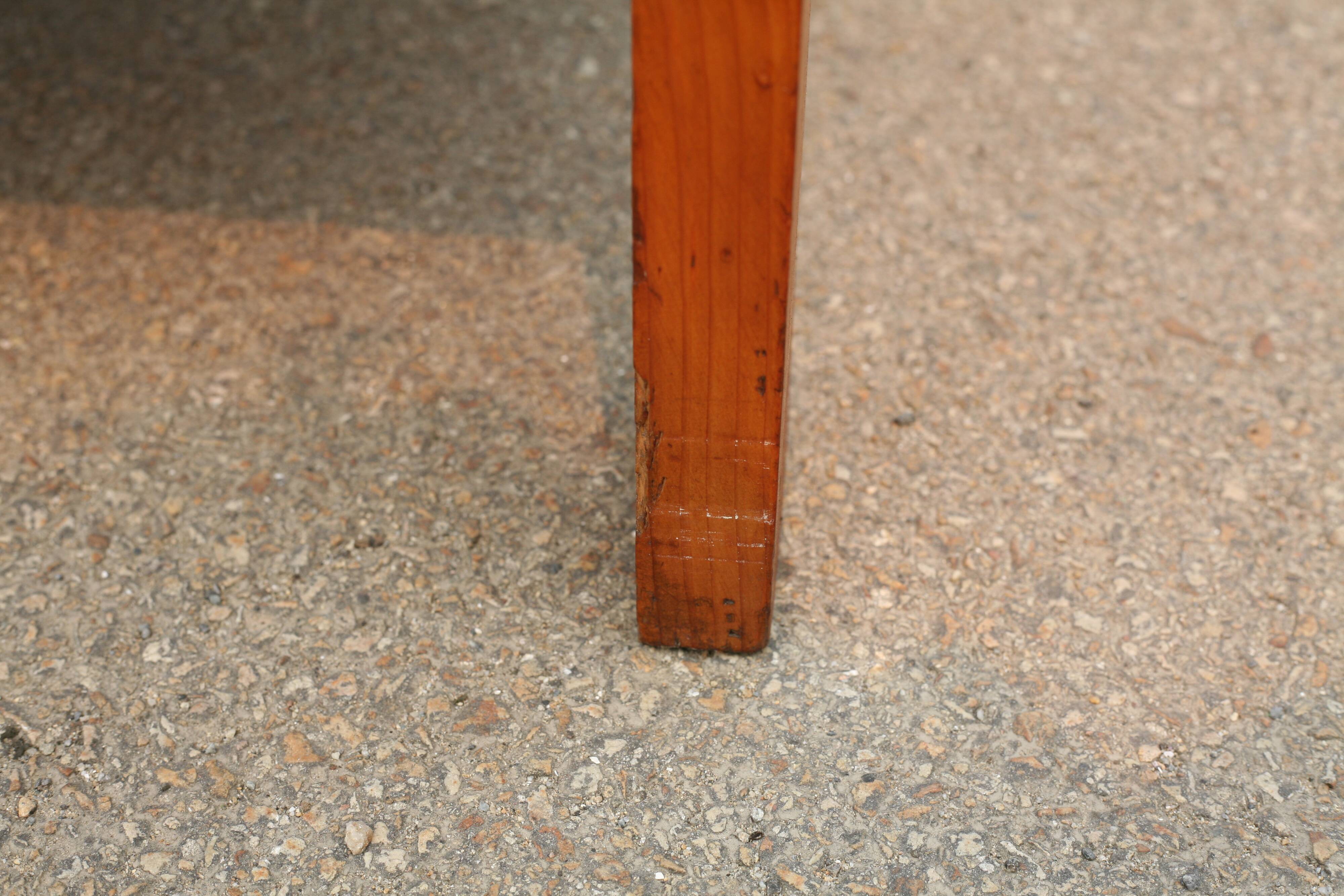 Pair of pine fireside chairs, France, 1960s, "raspberry" cushions