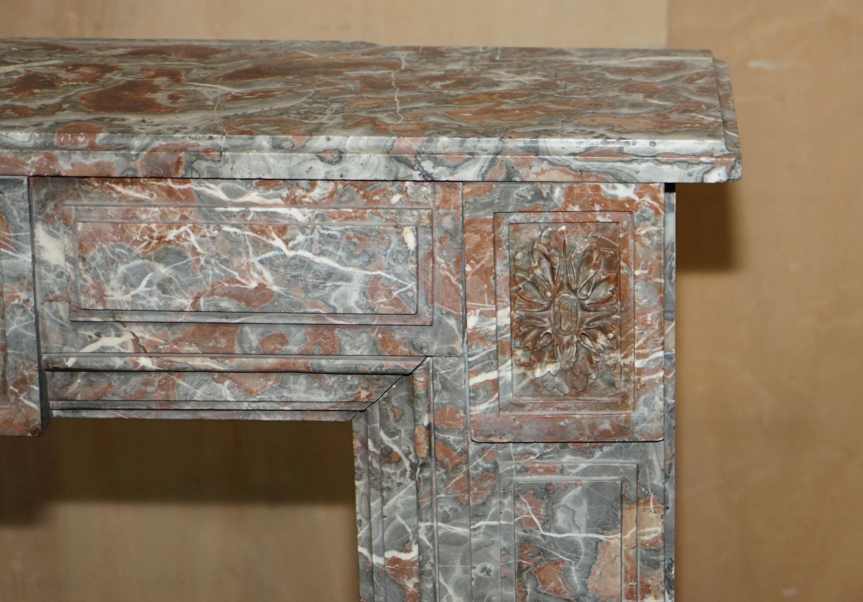 Antique marble fireplace in Saint Remy, Louis XVI style.