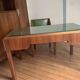 Rosewood desk, armchair and bookshelf.