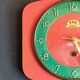 Vintage formica clock silent wall pendulum "FFR Morbier red green"