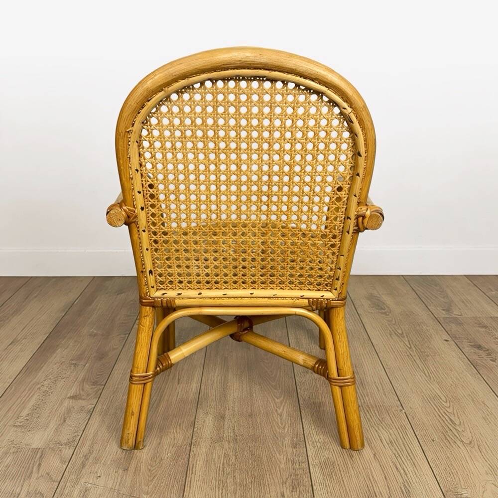 Child's armchair in rattan and caning from the 1960s.