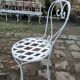 Antique wrought iron garden furniture