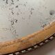 Old oval mirror stitched