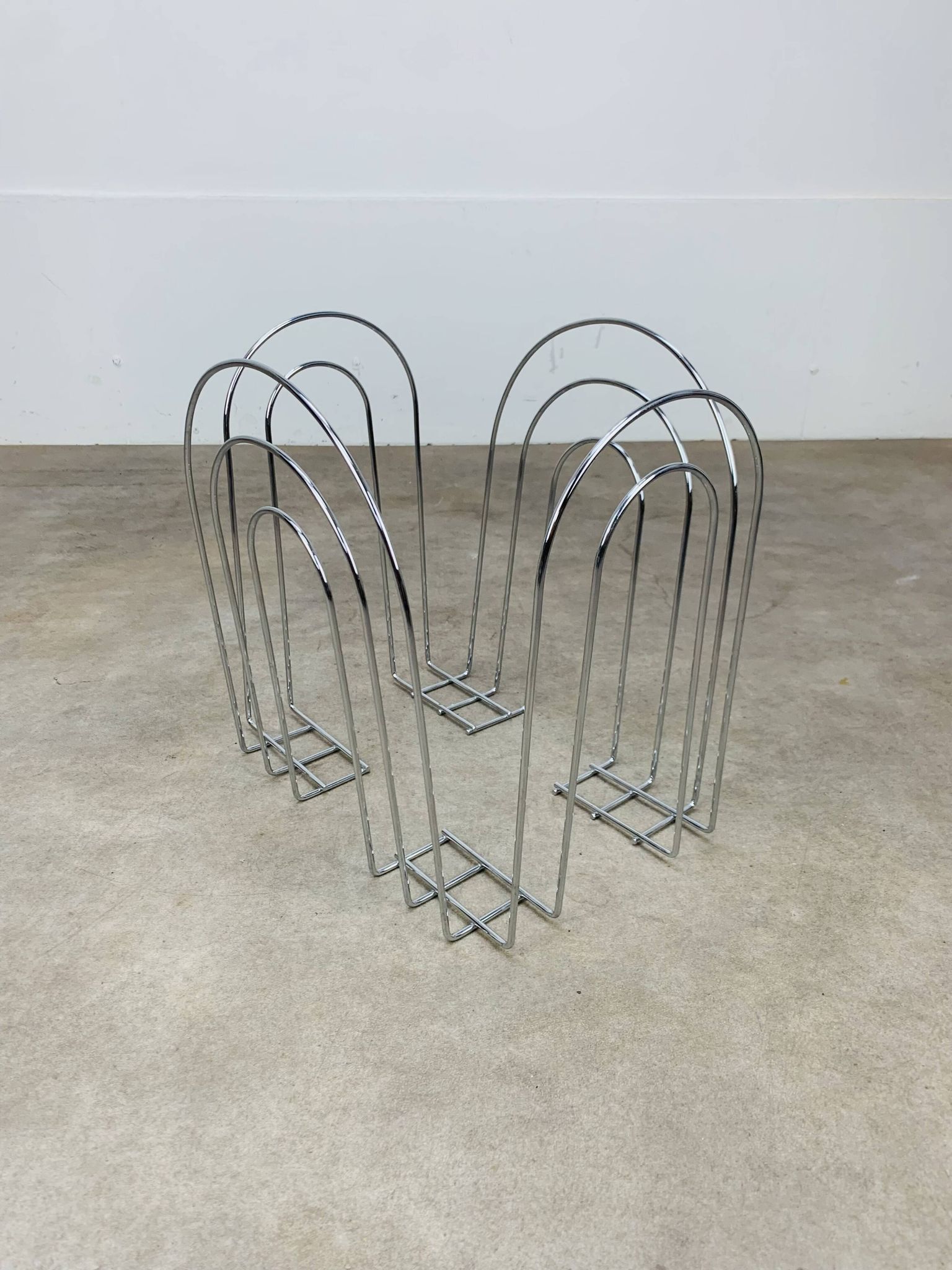 Postmodern chrome metal magazine rack from the 80s
