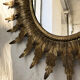 Miroir doré soleil fleuri ancien
